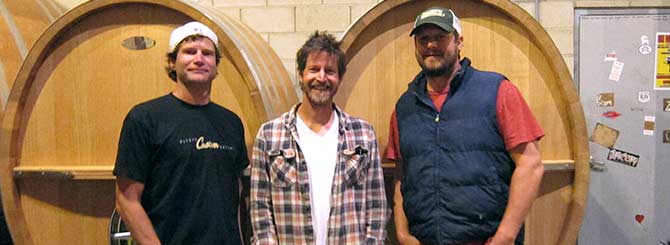 Smith has known his cellarhands, Mark Adams (L) and Don Burns, since high school